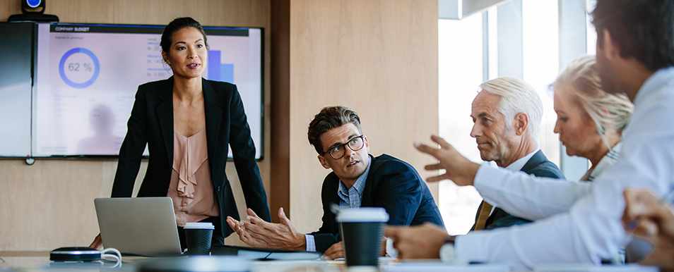 leader at a meeting as an image of someone building accountability vs ownership