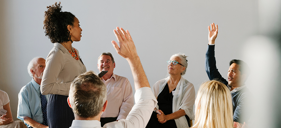 a community meeting illustraring emotional intelligence in change management