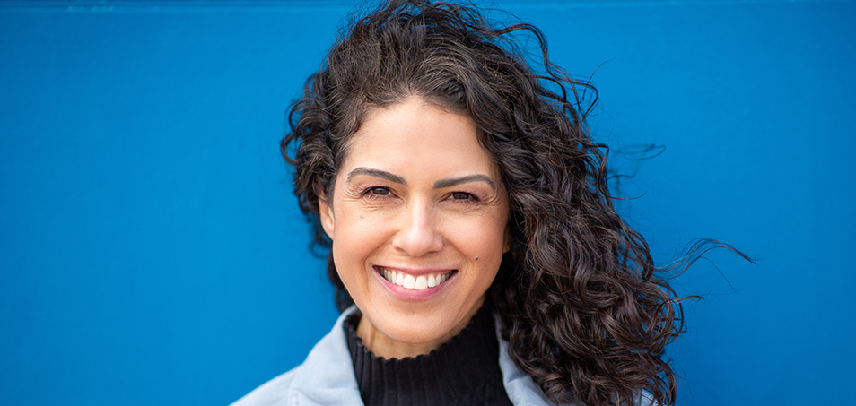 A woman exuding self-acceptance at work